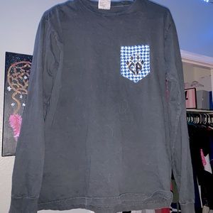 a retired Cheer athletics shirt